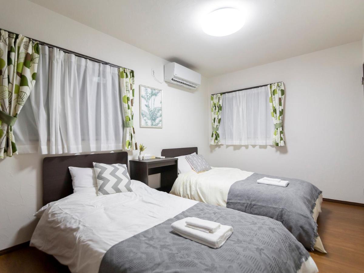 Ocean Front Maezato Apartment *
